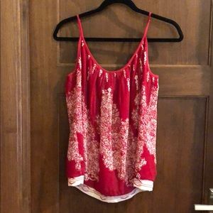 Cabi red sleeveless blouse.